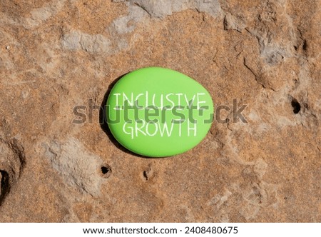 Inclusive growth symbol. Concept words Inclusive growth on beautiful green stone. Beautiful red stone background. Business inclusive growth concept. Copy space.
