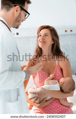 Closeup shot of caring concentrated young brown hair caucasian mother listening to male doctor and holding new born baby.