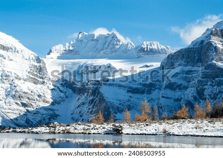 The Reflection in Minestima Lake, Larch Season in The Larch Valley, Fell in the Valley of Ten Peaks, Banff National Park, Canada Royalty-Free Stock Photo #2408503955