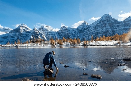 The Reflection in Minestima Lake, Larch Season in The Larch Valley, Fell in the Valley of Ten Peaks, Banff National Park, Canada Royalty-Free Stock Photo #2408503979