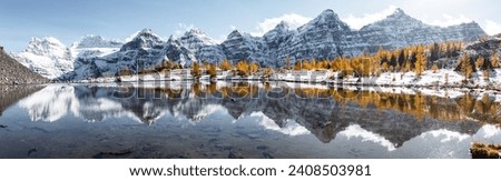 The Reflection in Minestima Lake, Larch Season in The Larch Valley, Fell in the Valley of Ten Peaks, Banff National Park, Canada Royalty-Free Stock Photo #2408503981