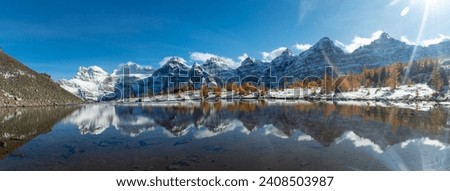 The Reflection in Minestima Lake, Larch Season in The Larch Valley, Fell in the Valley of Ten Peaks, Banff National Park, Canada Royalty-Free Stock Photo #2408503987
