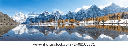 The Reflection in Minestima Lake, Larch Season in The Larch Valley, Fell in the Valley of Ten Peaks, Banff National Park, Canada Royalty-Free Stock Photo #2408503991