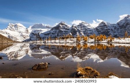 The Reflection in Minestima Lake, Larch Season in The Larch Valley, Fell in the Valley of Ten Peaks, Banff National Park, Canada Royalty-Free Stock Photo #2408503993
