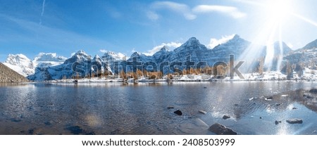 The Reflection in Minestima Lake, Larch Season in The Larch Valley, Fell in the Valley of Ten Peaks, Banff National Park, Canada Royalty-Free Stock Photo #2408503999