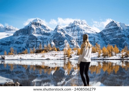 Hiking Girl, The Larch Season in The Larch Valley, Fall in the Valley of Ten Peaks, Banff National Park, Canada Royalty-Free Stock Photo #2408506279