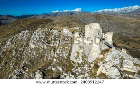Rocca Calascio 2023. Aerial view of the castle of Rocca Calascio, built in 1140, it is the highest fortification in the Apennines. January 2024 Abruzzo, Italy Royalty-Free Stock Photo #2408512247