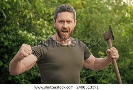 image of man threatening with hatchet. man threatening with hatchet. man threatening Royalty-Free Stock Photo #2408513391