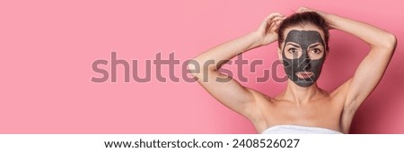 young woman with bare shoulders with a face peeling mask. Spa treatments. Banner.