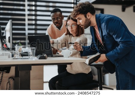 Corporate Office Meeting. Multiracial Team Discussing Strategic Planning and Business Development Together. Royalty-Free Stock Photo #2408547275