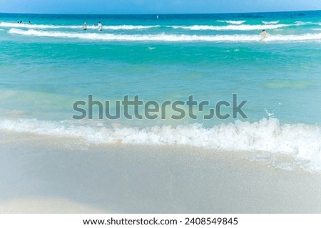 Discover Lido Key Beach, a scenic Sarasota gem with powdery sand, a swimming pool, and more. Ideal for those seeking cosmopolitan living and unspoiled nature, it offers pristine beaches, parks, and Royalty-Free Stock Photo #2408549845