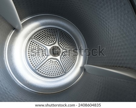 Drum (tumbler) in condenser vented clothes dryer.  Shell with baffles and lifters.
