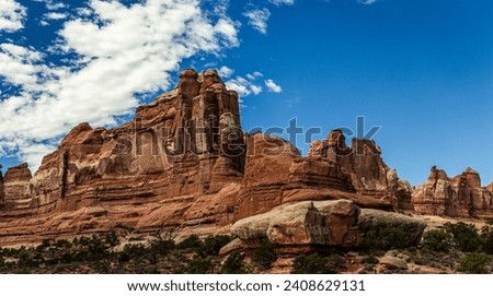 Wide shot of mesas and buttes in canyonlands national park at sunny day in Utah, America, usa Royalty-Free Stock Photo #2408629131