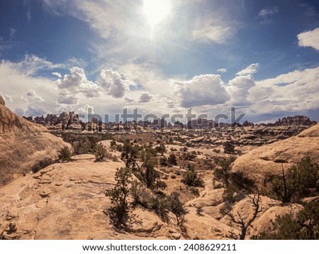 Wide view of canyons, mesas and buttes nature in canyonlands national park in Utah, America, usa Royalty-Free Stock Photo #2408629211