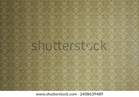 Old wallpaper on the wall. Old wallpaper for texture or background. Royalty-Free Stock Photo #2408639489