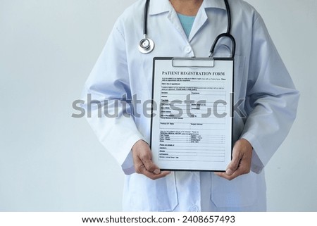 Doctor, dental woman holding a stethoscope holding a form for recording on a clipboard being diagnosed. Hygiene. Patient's history. Health professional on white background.