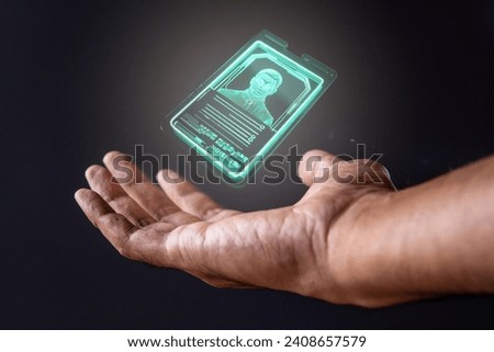 Closeup image of hand and digital identification card or digital ID on black background. Technology concept. Royalty-Free Stock Photo #2408657579