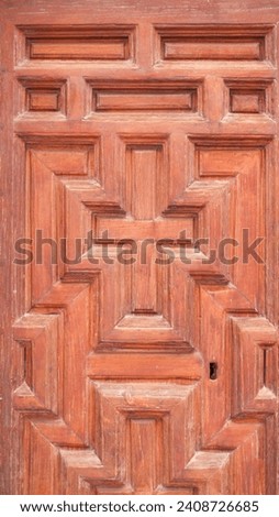 Cross carved wooden ancient door