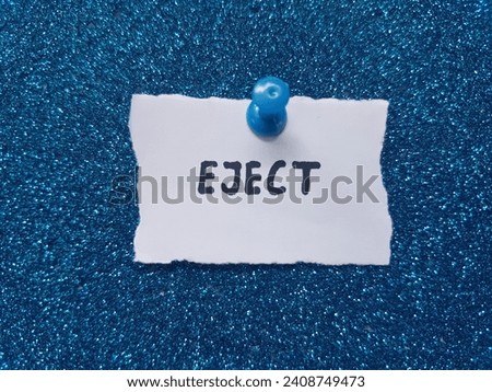 The word eject on a blue background. Royalty-Free Stock Photo #2408749473