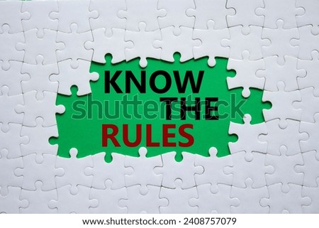 Know the rules symbol. Concept words Know the rules on white puzzle. Beautiful green background. Business and Know the rules concept. Copy space.