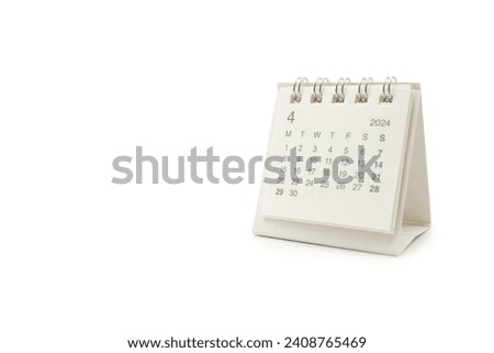 Simple desk calendar for April 2024 isolated on white background. Calendar concept with copy space. Clipping path.
