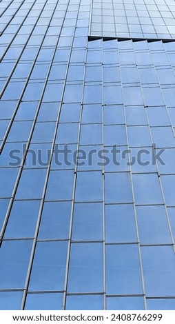 photo of a building wall made of glass