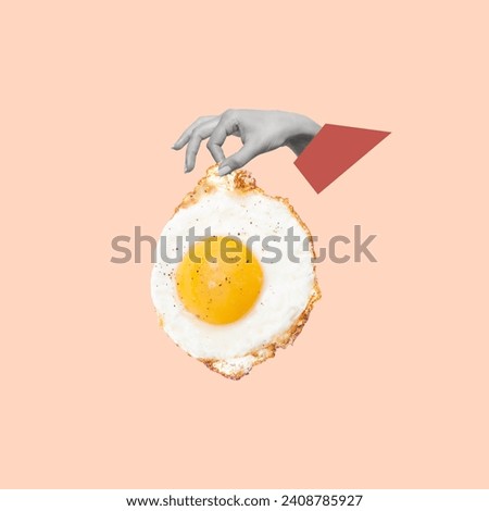 Contemporary art collage of hand holding fried egg. The concept of cooking. Minimalism. Modern design. Copy space.