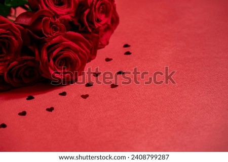 Valentine day background with red hearts on red background, top view