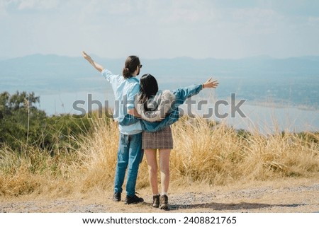 Young Couple Having Fun On Mountain Holiday Together. Valentine's Day concept. Lovers celebrating Valentine's Day.