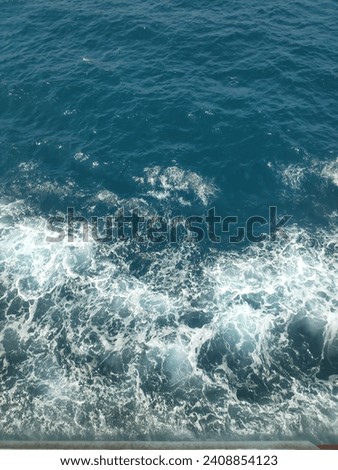 I took this picture since i sailing to other island, Water waves from ship. Having nice water of the sea to looked it