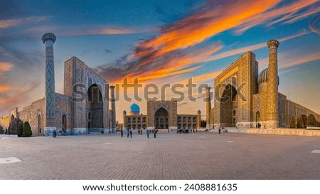 Registan, an old public square in the heart of the ancient city of Samarkand, Uzbekistan.

Translation: In the name of Allah Almighty who creates Royalty-Free Stock Photo #2408881635