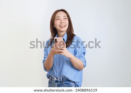 portrait of a smiling woman over isolated background.Woman posing surprise over white background,copy space.