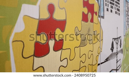 Photo picture of puzzles on the wall, yellow puzzles, background