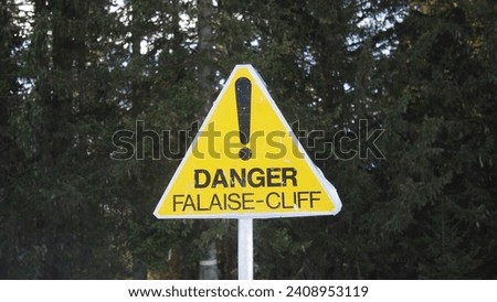 Danger sign on a ski slope in the French Alps, France