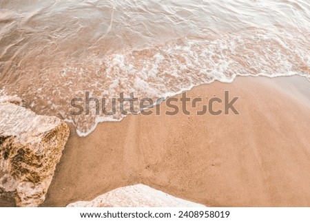 Lake Michigan Foam Waves in Summer Sandy Shoreline Royalty-Free Stock Photo #2408958019
