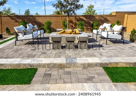 Back Patio Conversation Area With Fire Pit Royalty-Free Stock Photo #2408961945