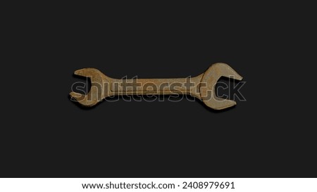 Old rusty wrench isolated on black baground