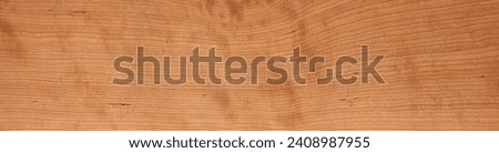 Cherry wood tabletop texture. Wooden plank texture. Long wooden desktop background. Empty wood desktop texture background.