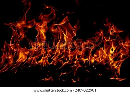 Fire flame isolate on black background. Burn flames, abstract texture. Art design for fire pattern, flame texture. Royalty-Free Stock Photo #2409022901