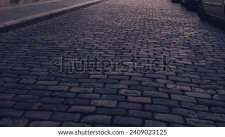 photo of a street that is still ancient and made of brick Royalty-Free Stock Photo #2409023125