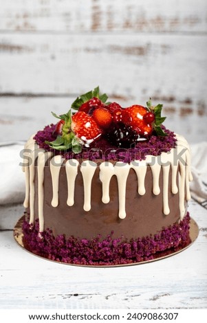 Birthday cake. Fruit cake on a white background