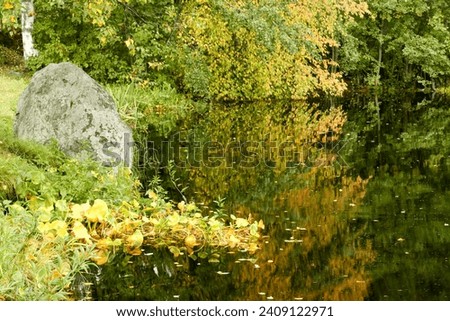 Autumn pictures with water reflection and background faded