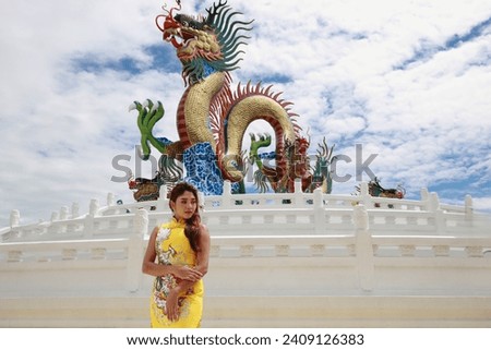woman wearing traditional cheongsam qipao dress, Happy Chinese new year