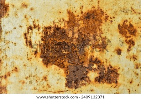 Abstract photograph of a corroded surface of a Metal part.Brown rusts.Iron surface exposed to Oxygen.