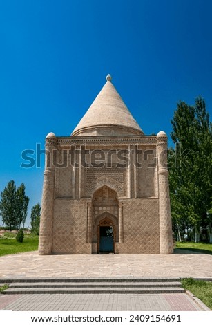 Aisha-Bibi Mausoleum, a 12th-century Karakhanid architectural, museum beneath its ornate terracotta-adorned dome.