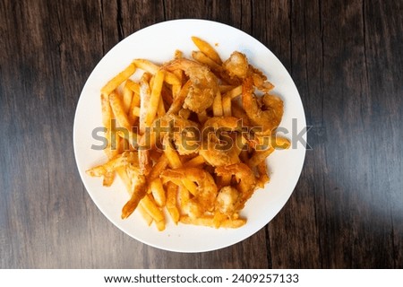Fried Shrimp and Fries on white plate