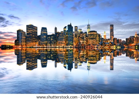 Reflection of Manhattan skyline at twilight.