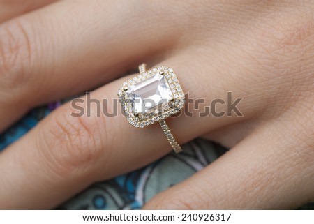 engagement ring on woman's hand Royalty-Free Stock Photo #240926317