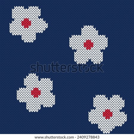 Floral knitted seamless pattern 70s . White flowers on navy blue background. Retro style. Vector illustration. Royalty-Free Stock Photo #2409278843