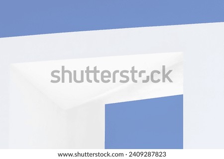 Abstract architecture background. Large open window detail against a clear blue sky. Exterior white concrete walls building fragment. Minimalist design. Minimal, modern, contemporary structure concept